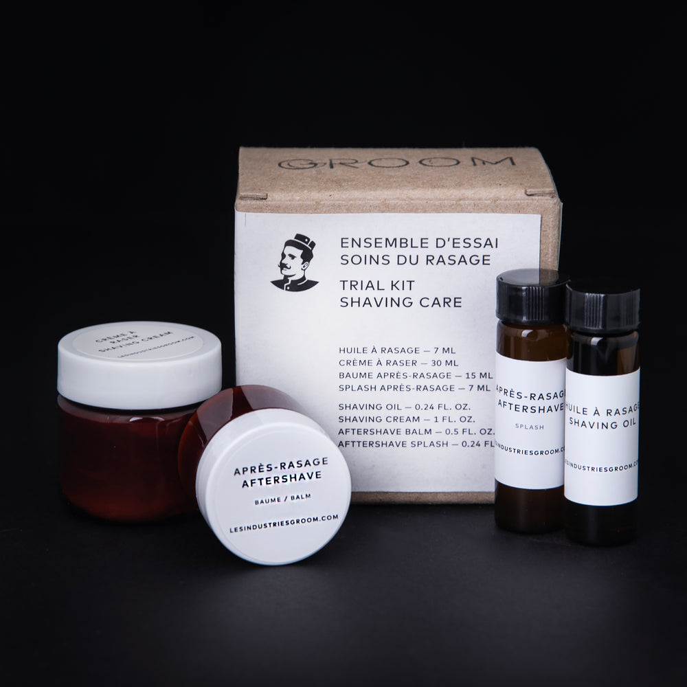 GROOM's Shaving Care Trial Kit against a black background. The kit includes a jar of aftershave balm, a jar of shaving cream, a vial of aftershave splash, and a vial of shaving oil, all enclosed in a cardboard giftbox.