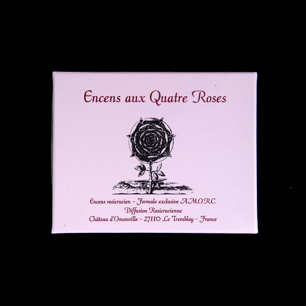 Pink box containing "Quatre Roses" Rosicrucian incense, displayed against a black background