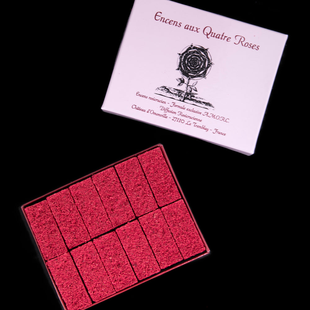 Open box revealing 12 tighly packed bricks of "Quatre Roses"  incense