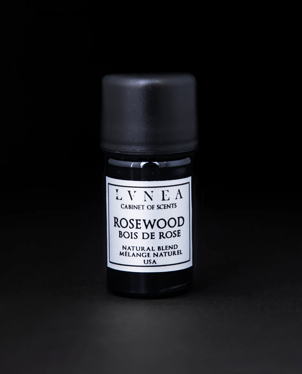 5ml black glass bottle of Rosewood natural blend essential oil