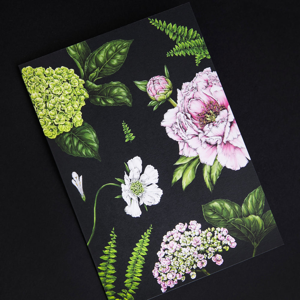 Greeting card featuring illustrations of summer botanicals on a black base