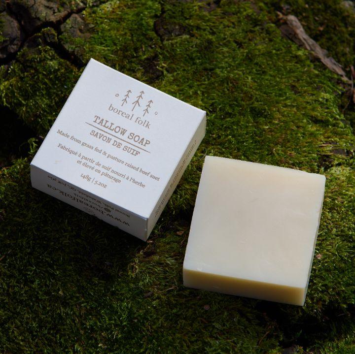 
                      
                        Box and bar of tallow soap laid atop a bed of moss
                      
                    