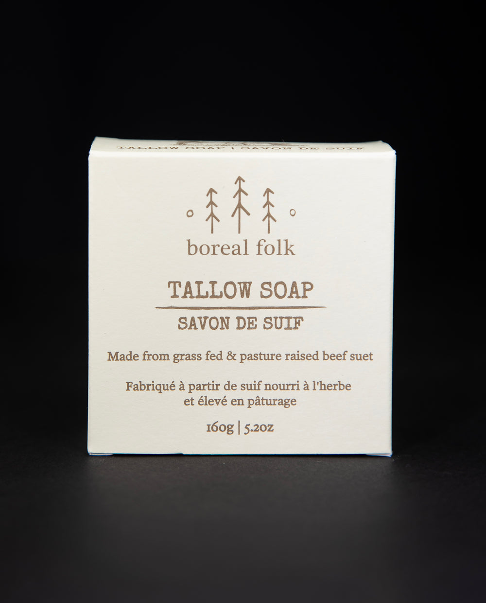 Cream coloured cardboard box of Boreal Folk's tallow soap against a black background