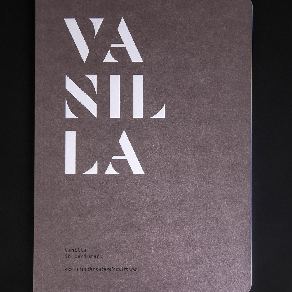 "Vanilla in Perfumery" book against black background. The cover is brown and features the word "VANILLA" in bold, graphic, white lettering.