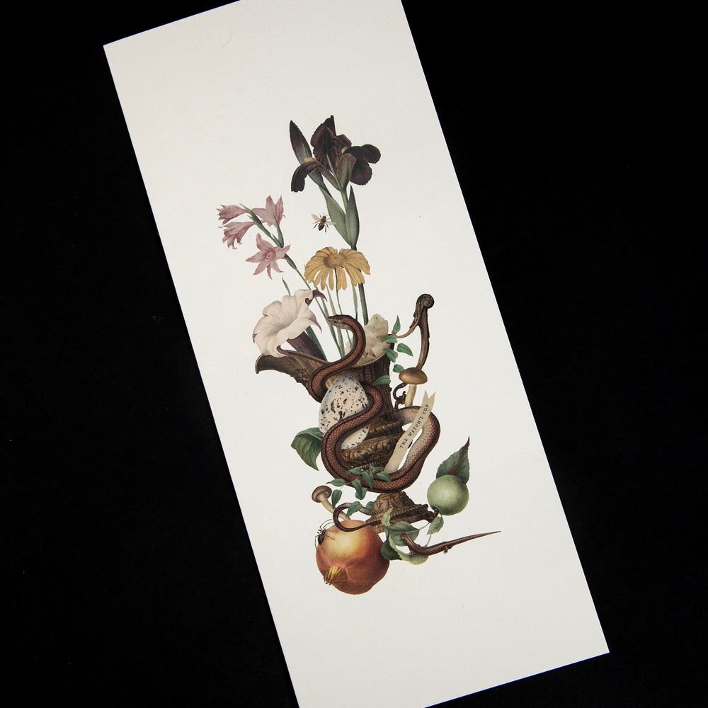 Long rectangular greeting card with a victorian-inspired illustration of a brass cup surrounded by a snake, a salamander, and various botanicals.